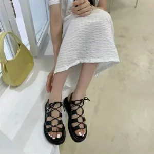 Lace up flat sandals
